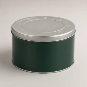 Unbranded christmas cookie gift tin on a warm gray studio background