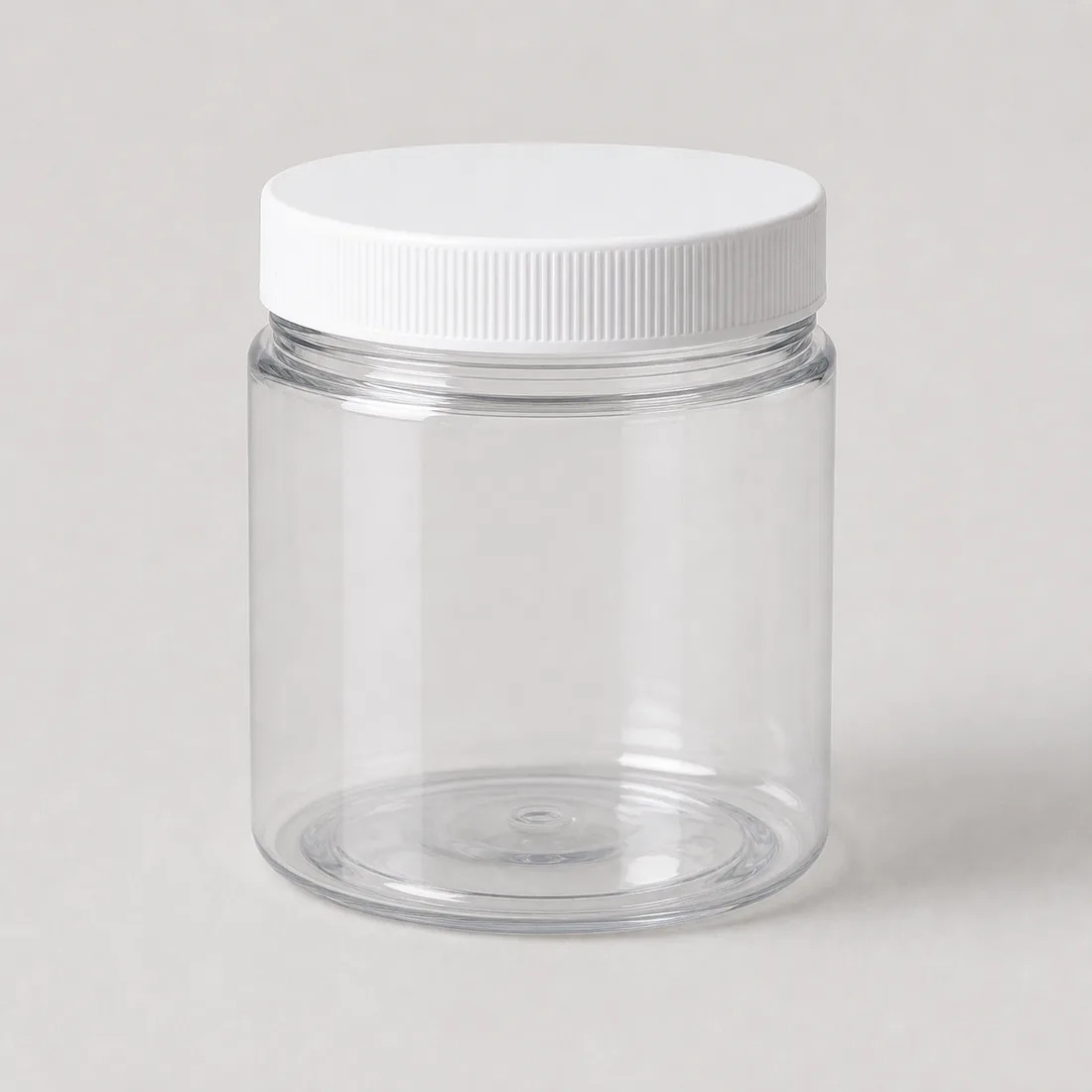 Unbranded clear plastic jar with white screw lid