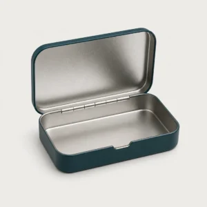 Unbranded premium mint tin case on a warm gray studio background